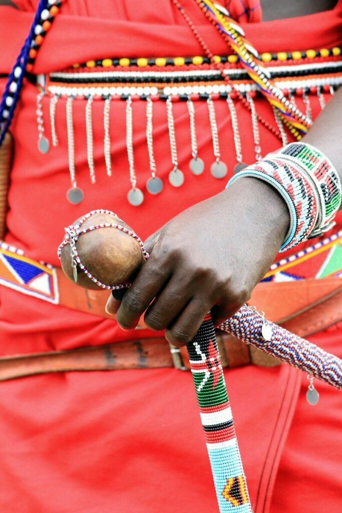 person wearing red white and blue bracelets